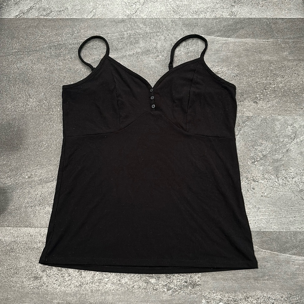Like new Torrid ribbed tank top with adjustable straps. Button details.